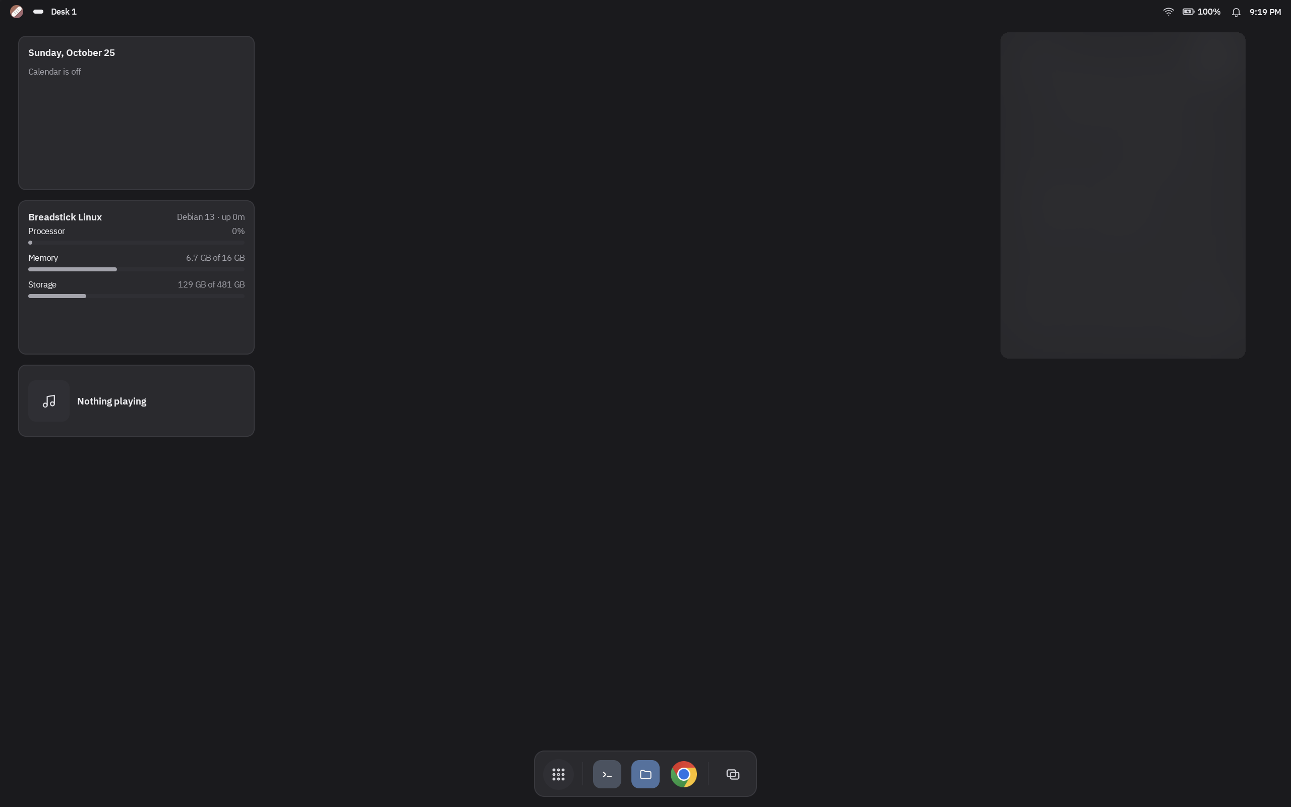 The Enhanced Desktop in dark mode running on a Googlebook: Breadstick's Agenda, Linux and Now playing widgets on the left, and an Android calendar widget on the right, covered for privacy